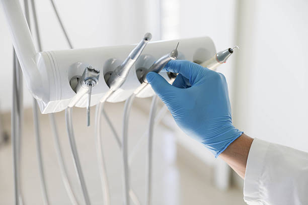 Professional Tooth Extraction technician working in Claremont, NC